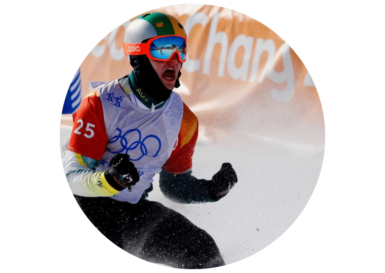 A man riding skis down the side of a snow covered slope.