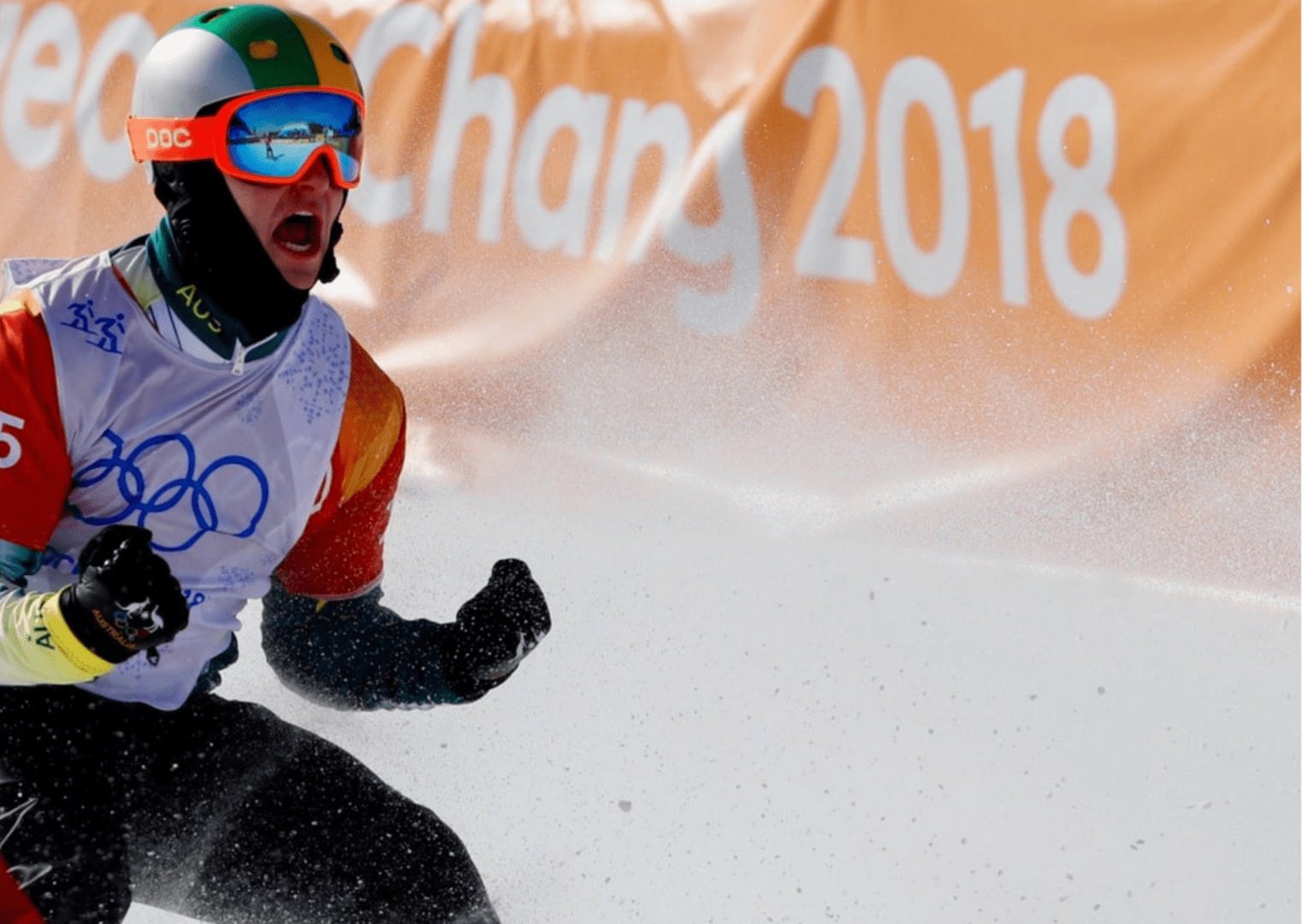 Australian snowboarder celebrating victory at the Olympics.